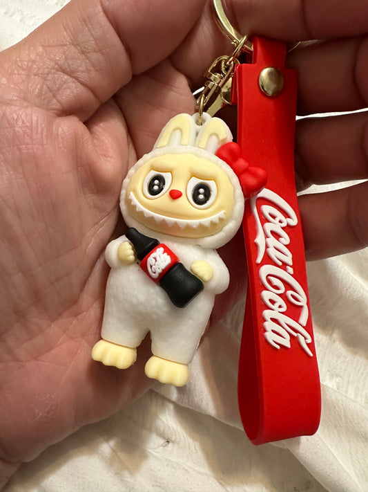 COKE key chain- Hugging the bottle